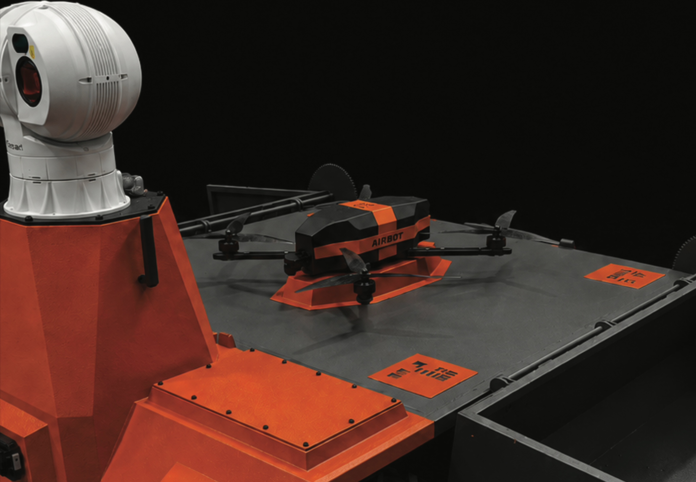 RAPTOR sensor turret and the integrated AIRBOT drone docked on the platform — close detail